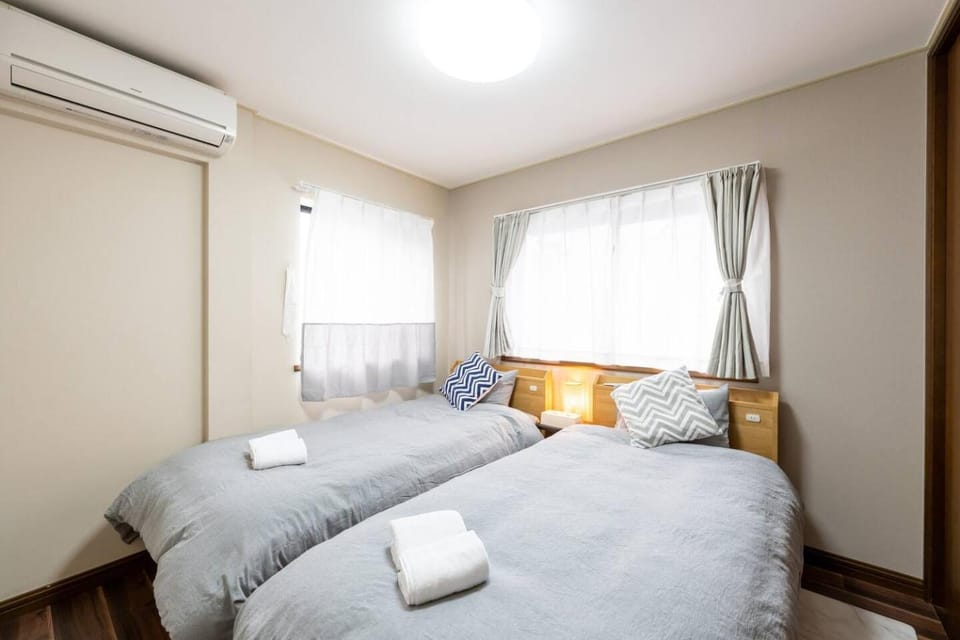 Bed, Photo of the whole room, Bedroom, towels, air conditioner
