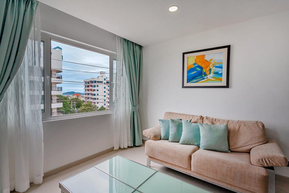 View (from property/room), Living room, Seating area, City view, Sea view, Street view, Quiet street view