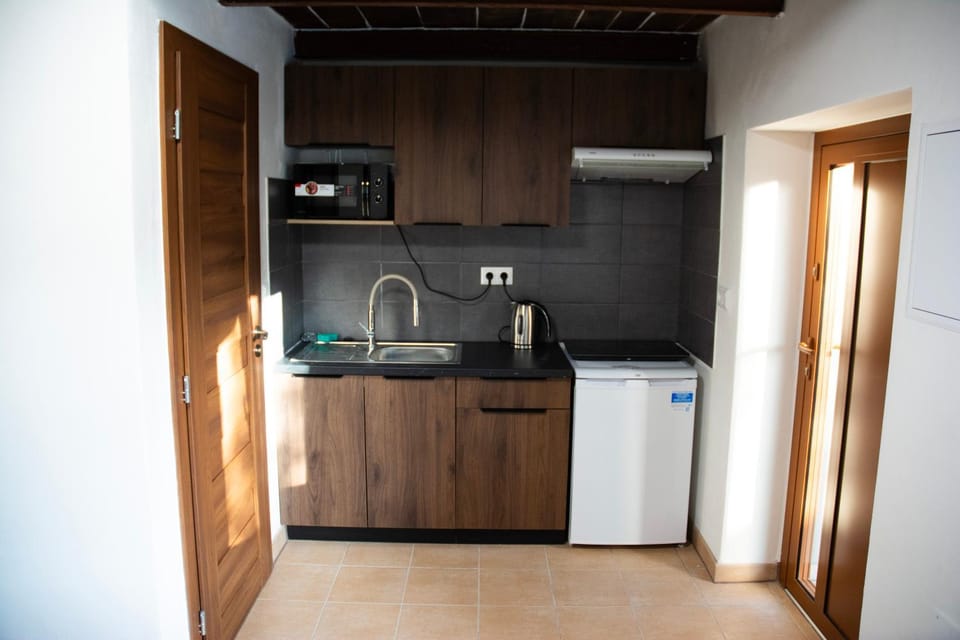 Kitchen or kitchenette, stove