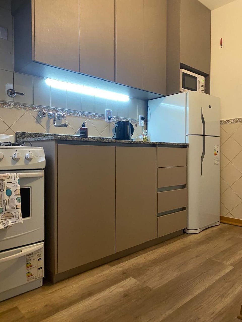 Kitchen or kitchenette, oven, toaster
