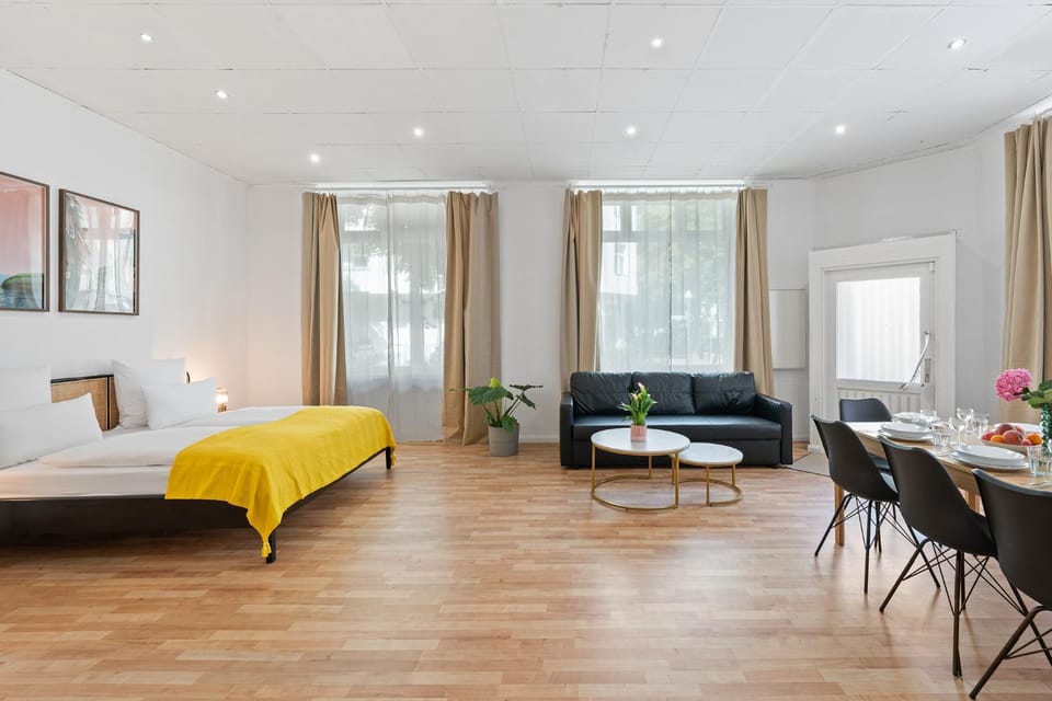 Bed, Living room, Seating area, Dining area