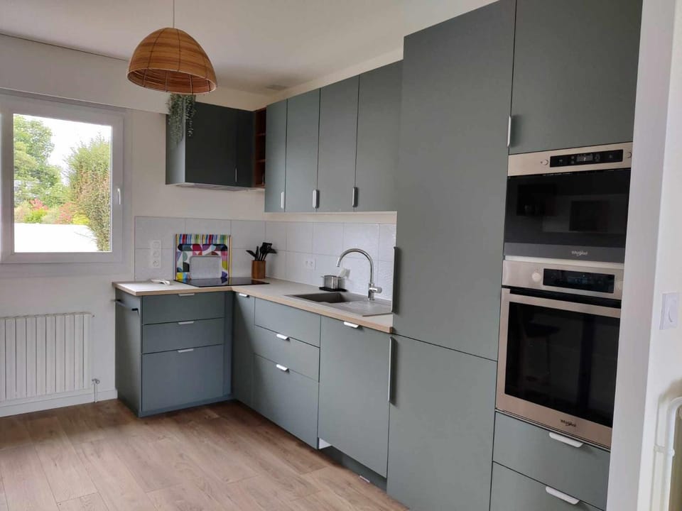 Kitchen or kitchenette, dishwasher, oven, stove