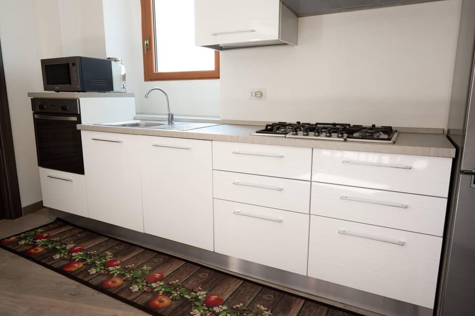 Kitchen or kitchenette, oven, stove