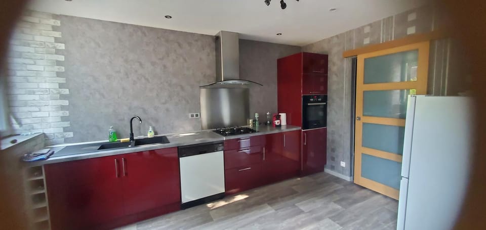 Kitchen or kitchenette, dishwasher, oven, stove
