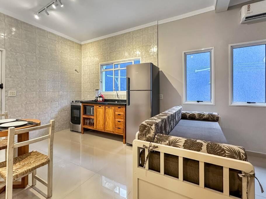 TV and multimedia, Kitchen or kitchenette, Seating area, Dining area, stove, air conditioner
