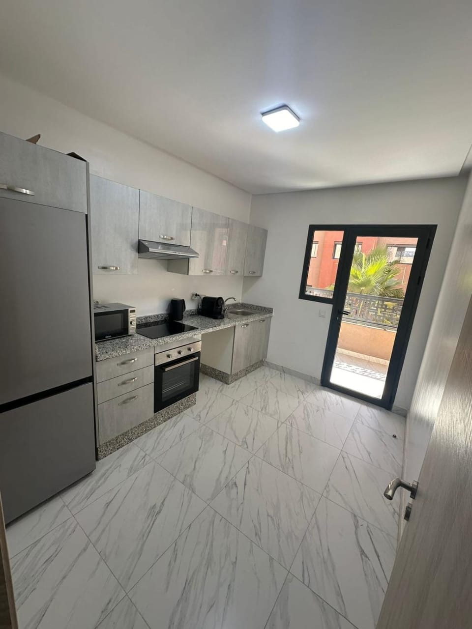 Kitchen or kitchenette, oven, stove