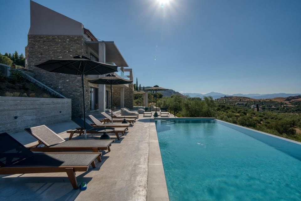 Property building, Patio, Day, Natural landscape, Swimming pool, sunbed