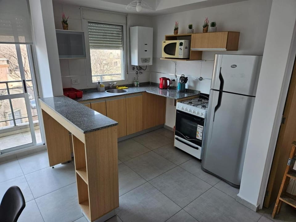 Kitchen or kitchenette, oven, stove