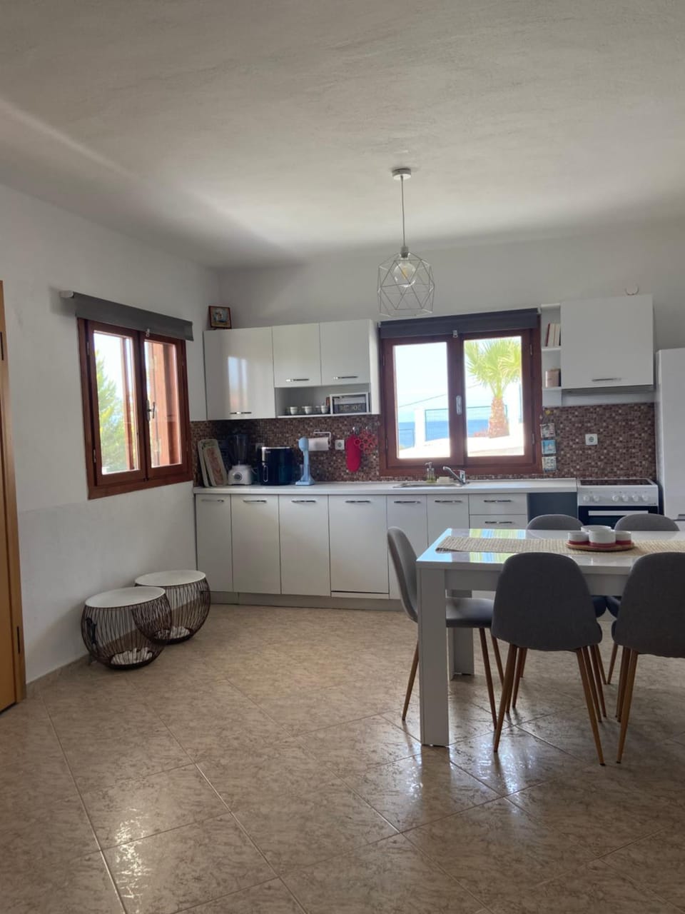 Kitchen or kitchenette, Photo of the whole room, Dining area, oven, stove