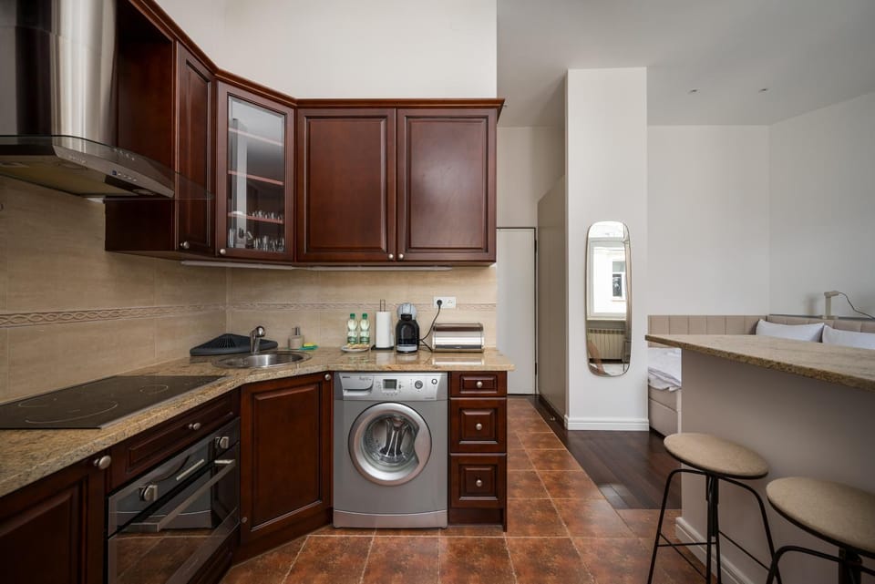 Kitchen or kitchenette, Dining area, dishwasher, oven, stove, washing machine