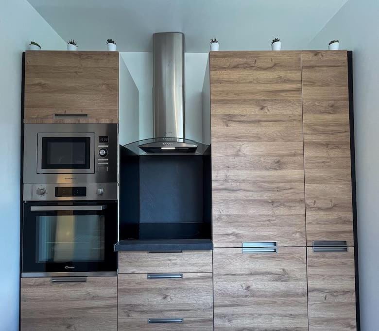 Kitchen or kitchenette, oven, stove