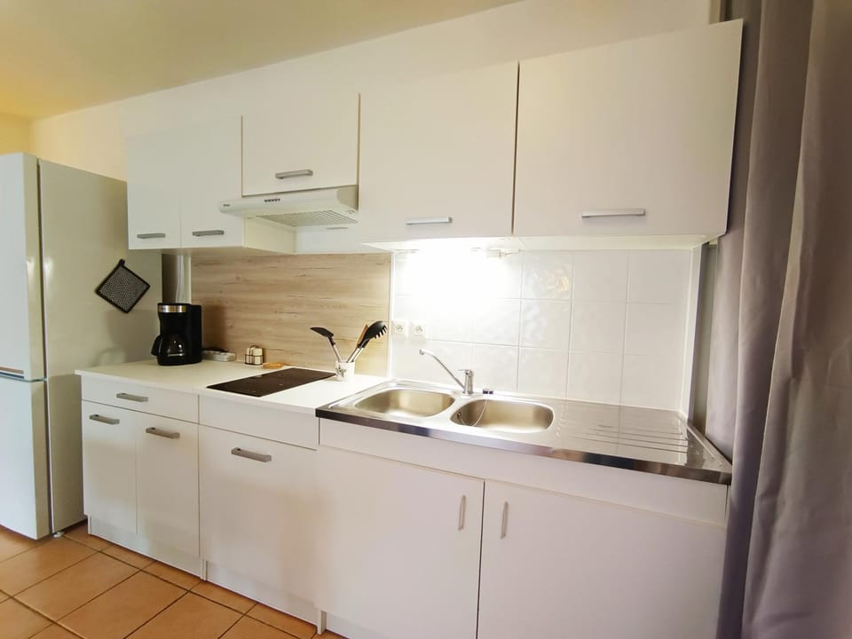Kitchen or kitchenette, stove