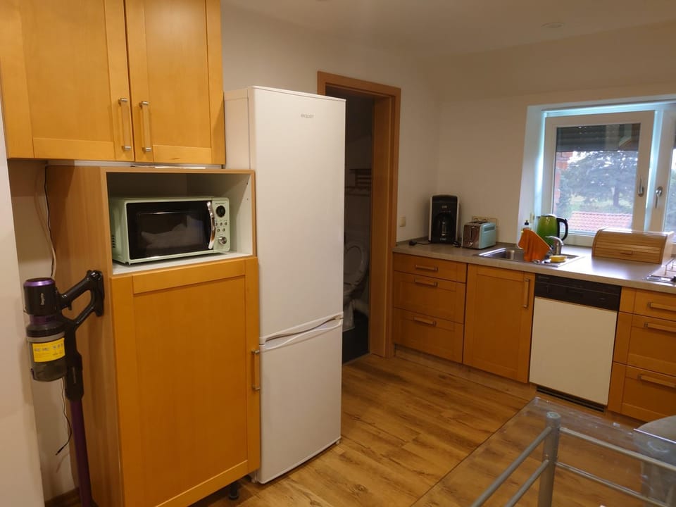 Kitchen or kitchenette, dishwasher, microwave, toaster