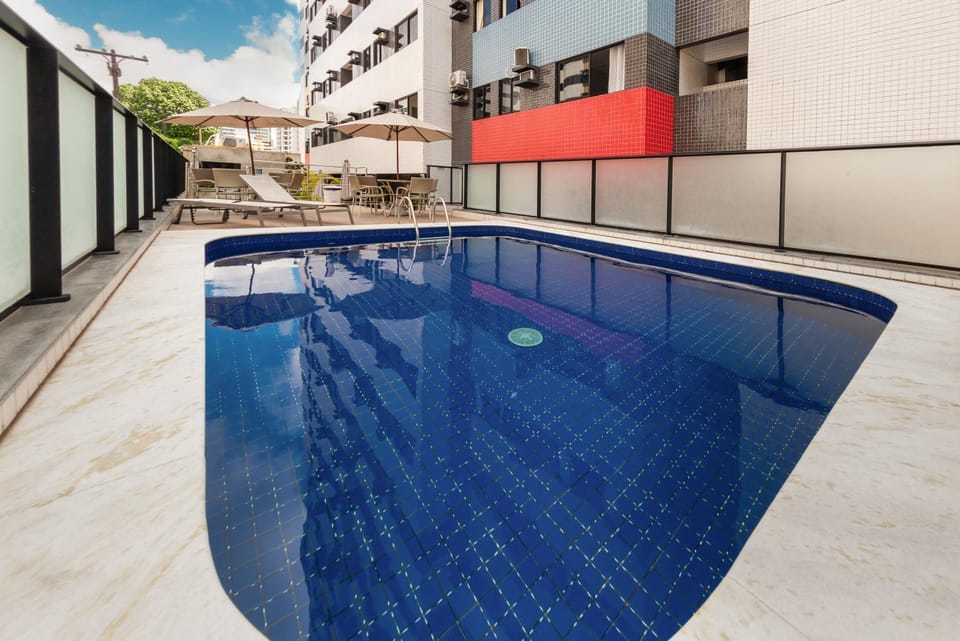 Property building, Day, Pool view, Swimming pool, sunbed
