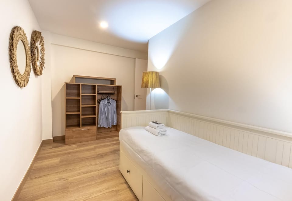 Bed, wardrobe