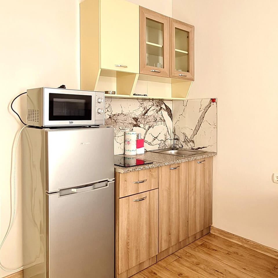 Kitchen or kitchenette, microwave