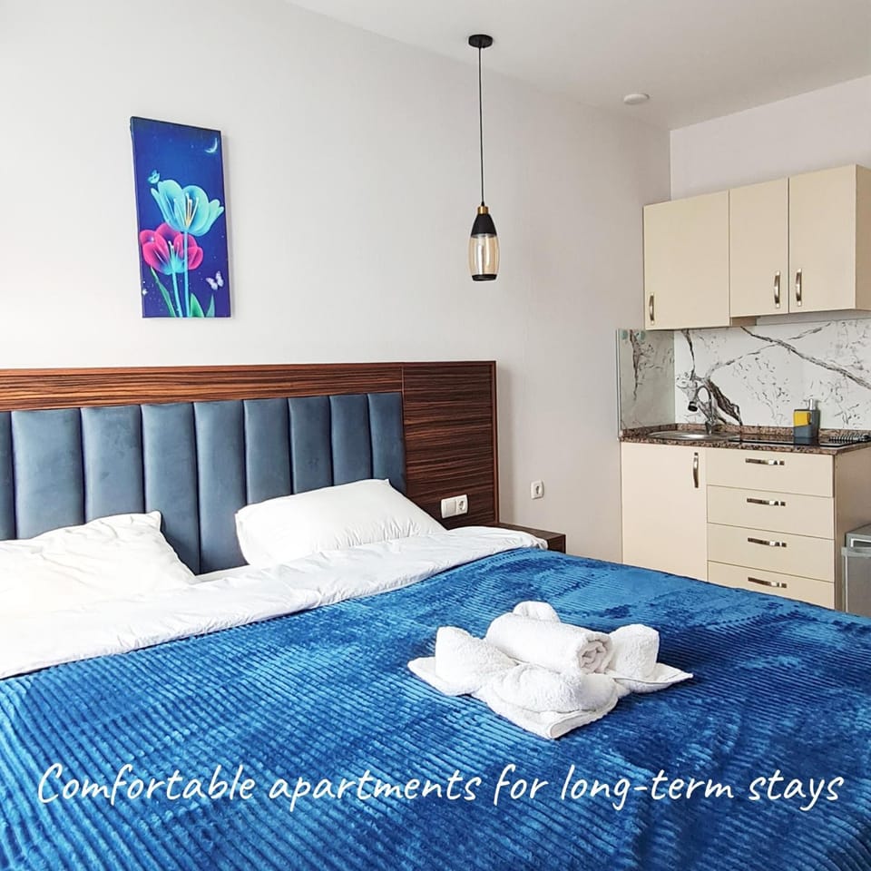 Bed, Photo of the whole room, Bedroom, towels, kitchen