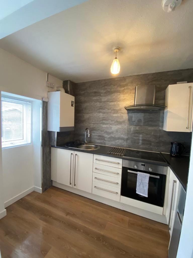 Kitchen or kitchenette, oven