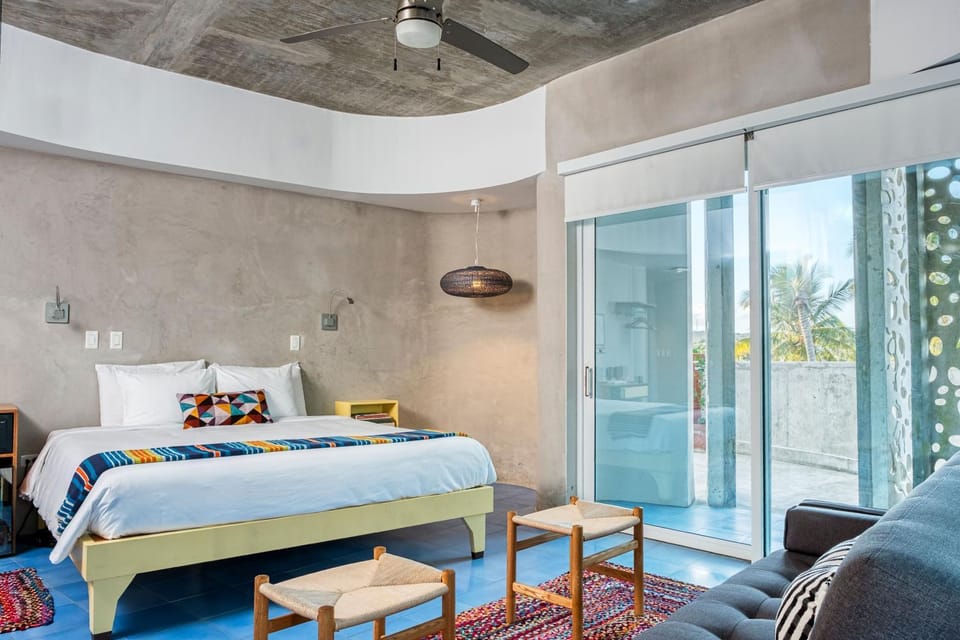 Bed, Living room, Seating area, Bedroom