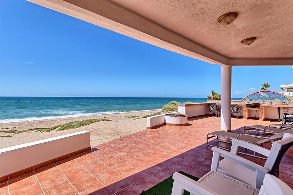 View (from property/room), Balcony/Terrace, Seating area, Beach, Sea view