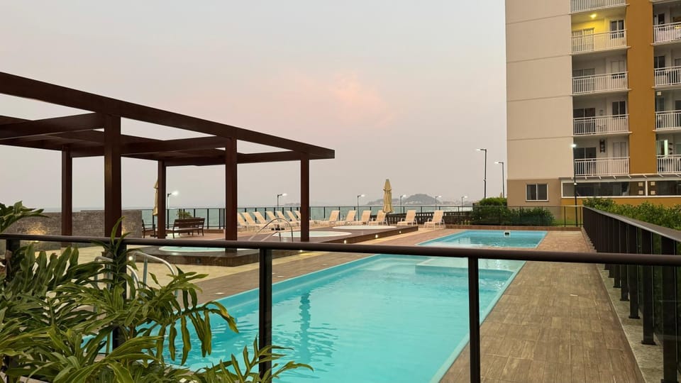 Property building, Day, Natural landscape, Pool view, Sea view, Swimming pool, sunbed
