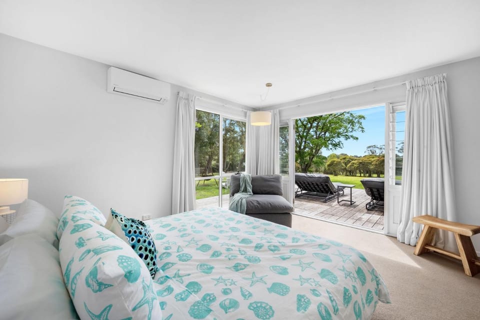 Patio, Bed, Photo of the whole room, Seating area, Bedroom