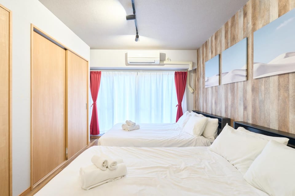 Bed, Bedroom, towels, wardrobe, air conditioner
