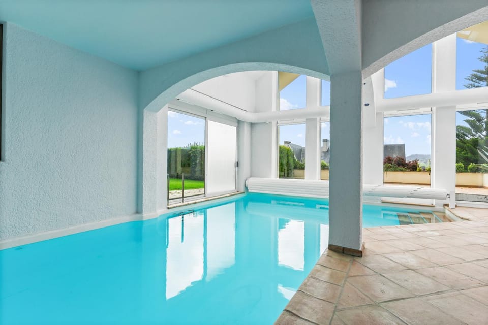 Property building, Living room, Swimming pool