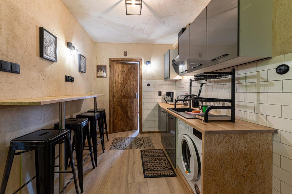 Kitchen or kitchenette, washing machine