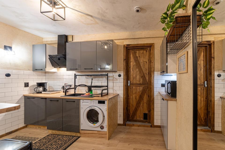 Kitchen or kitchenette, washing machine