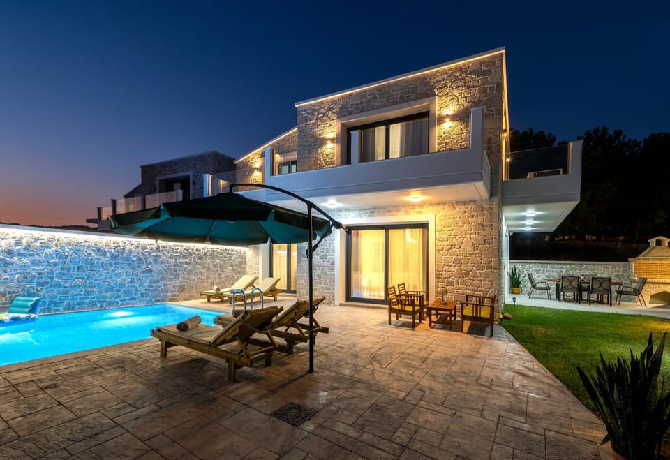 Property building, Patio, Night, Pool view, Swimming pool, sunbed