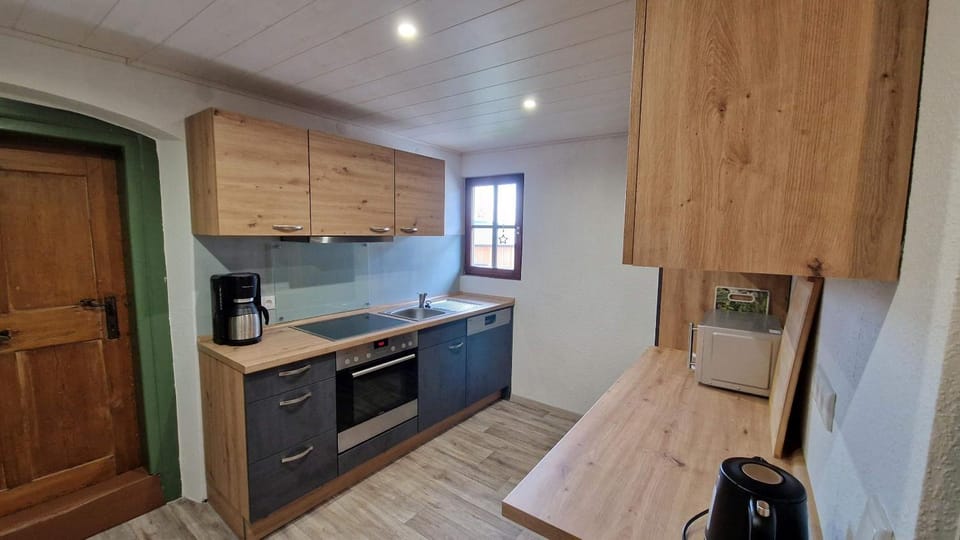 Kitchen or kitchenette, oven, stove