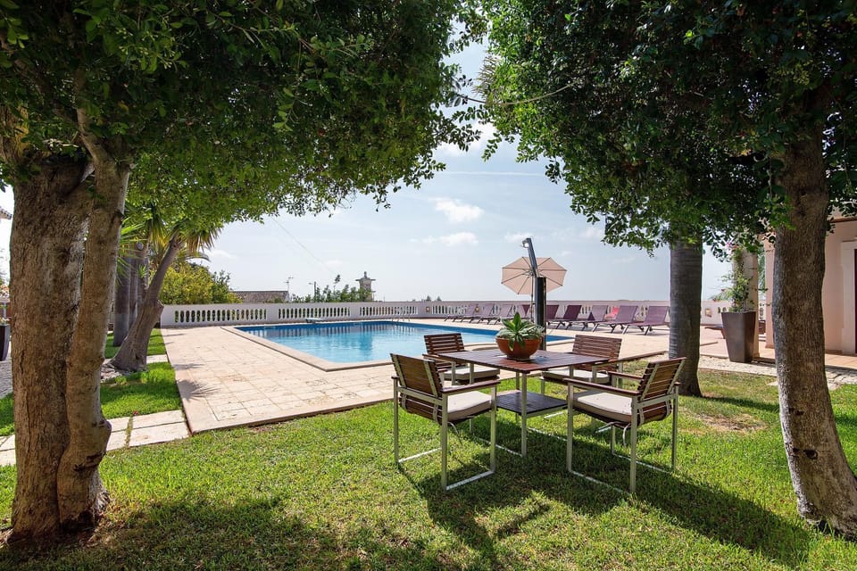Property building, Living room, Swimming pool
