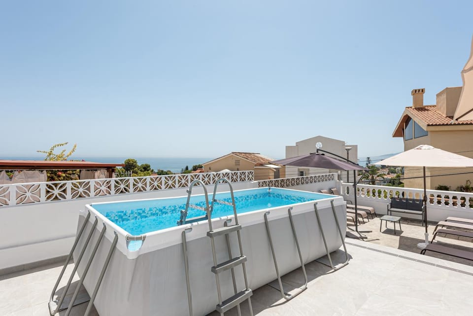 Property building, Living room, Swimming pool