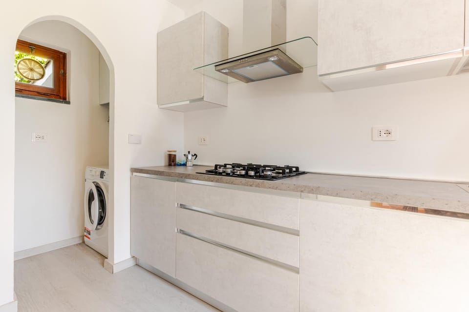 Kitchen or kitchenette, washing machine
