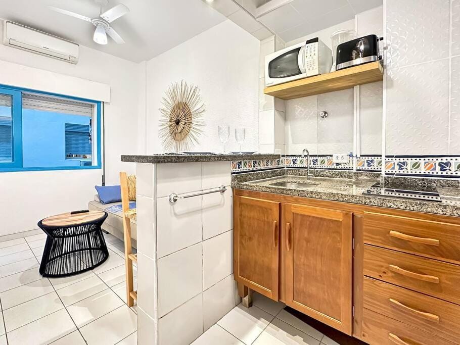 Kitchen or kitchenette, microwave, toaster