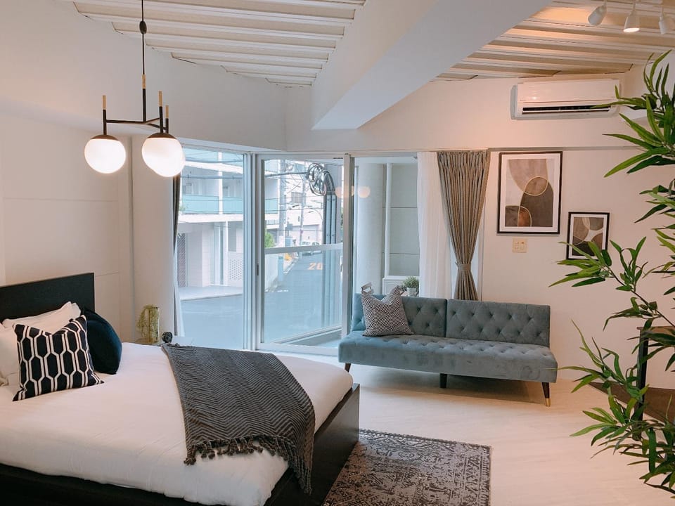 Bed, Balcony/Terrace, Seating area, Bedroom, air conditioner