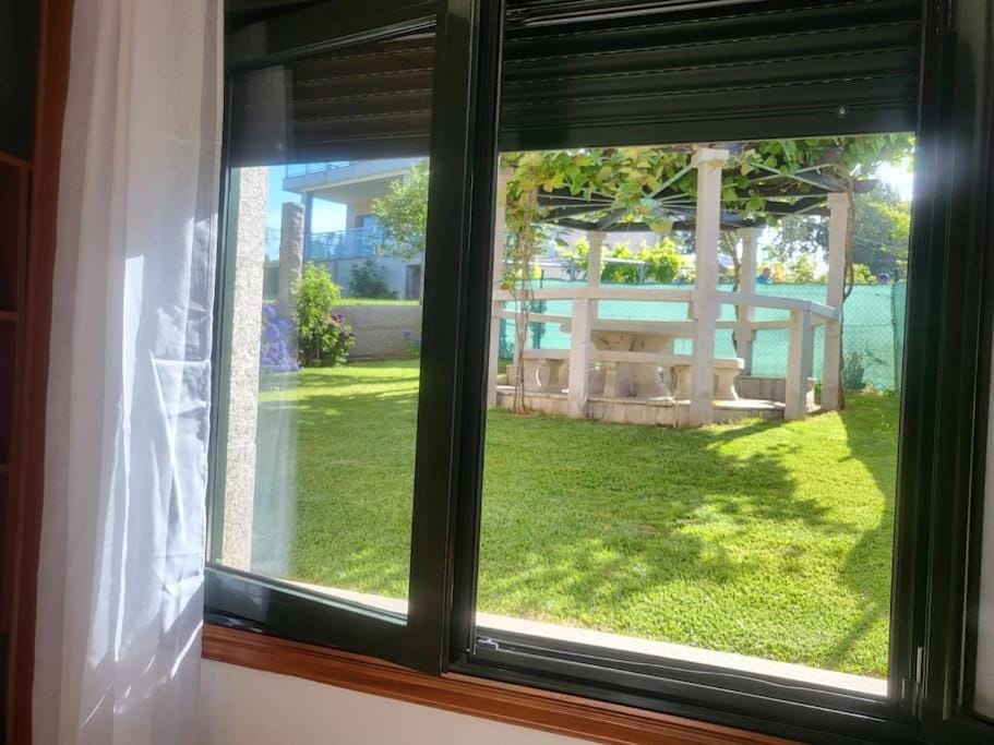 A Xaniña, chalet a 160 m playa de canelas House in Portonovo