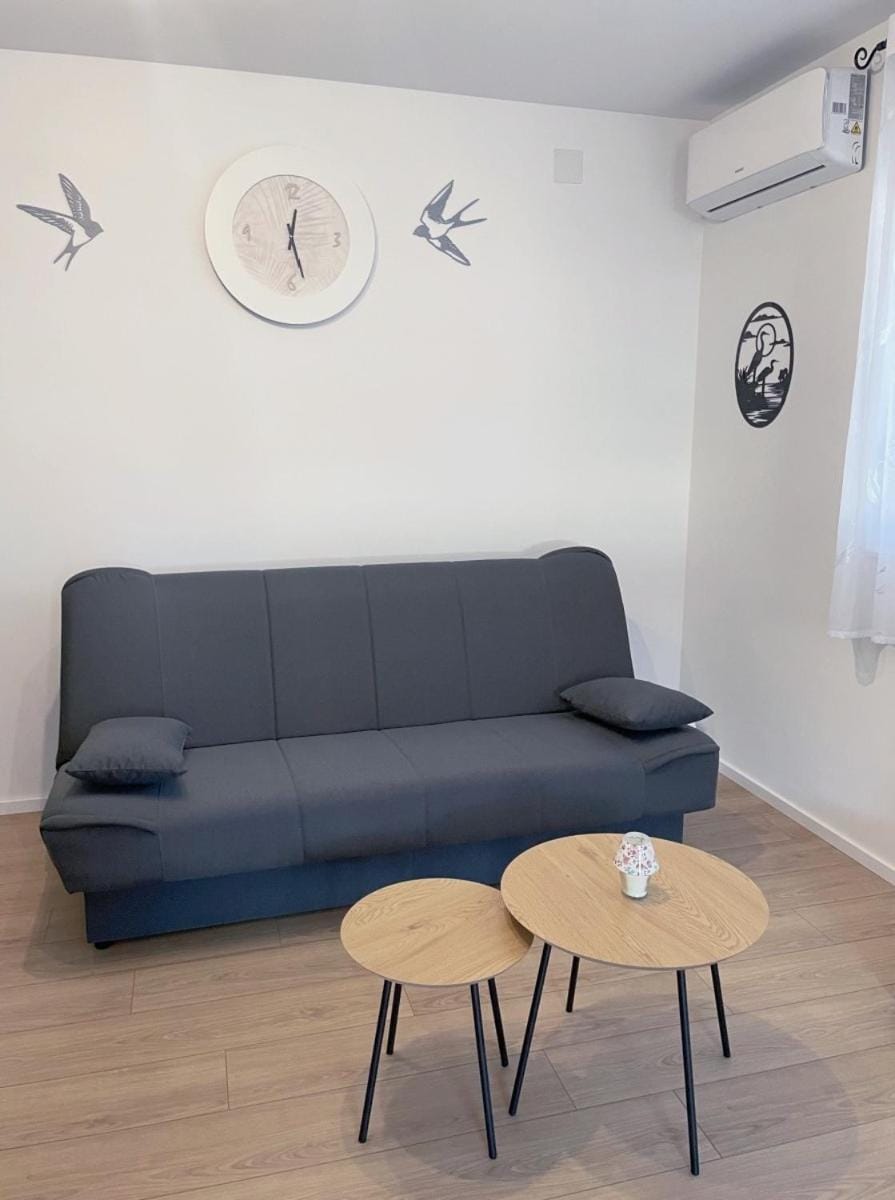 Living room, Seating area, Entertainment, air conditioner