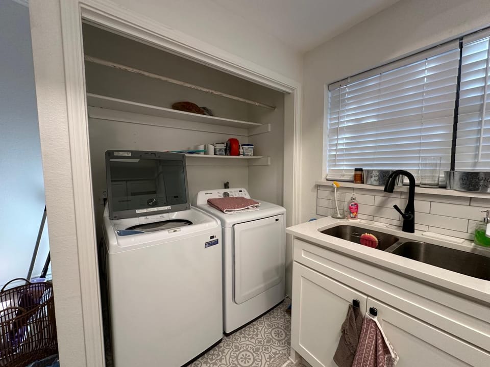 Kitchen or kitchenette, dishwasher, oven, stove, washing machine, dryer