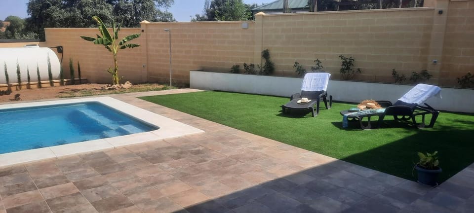 Property building, Living room, Swimming pool