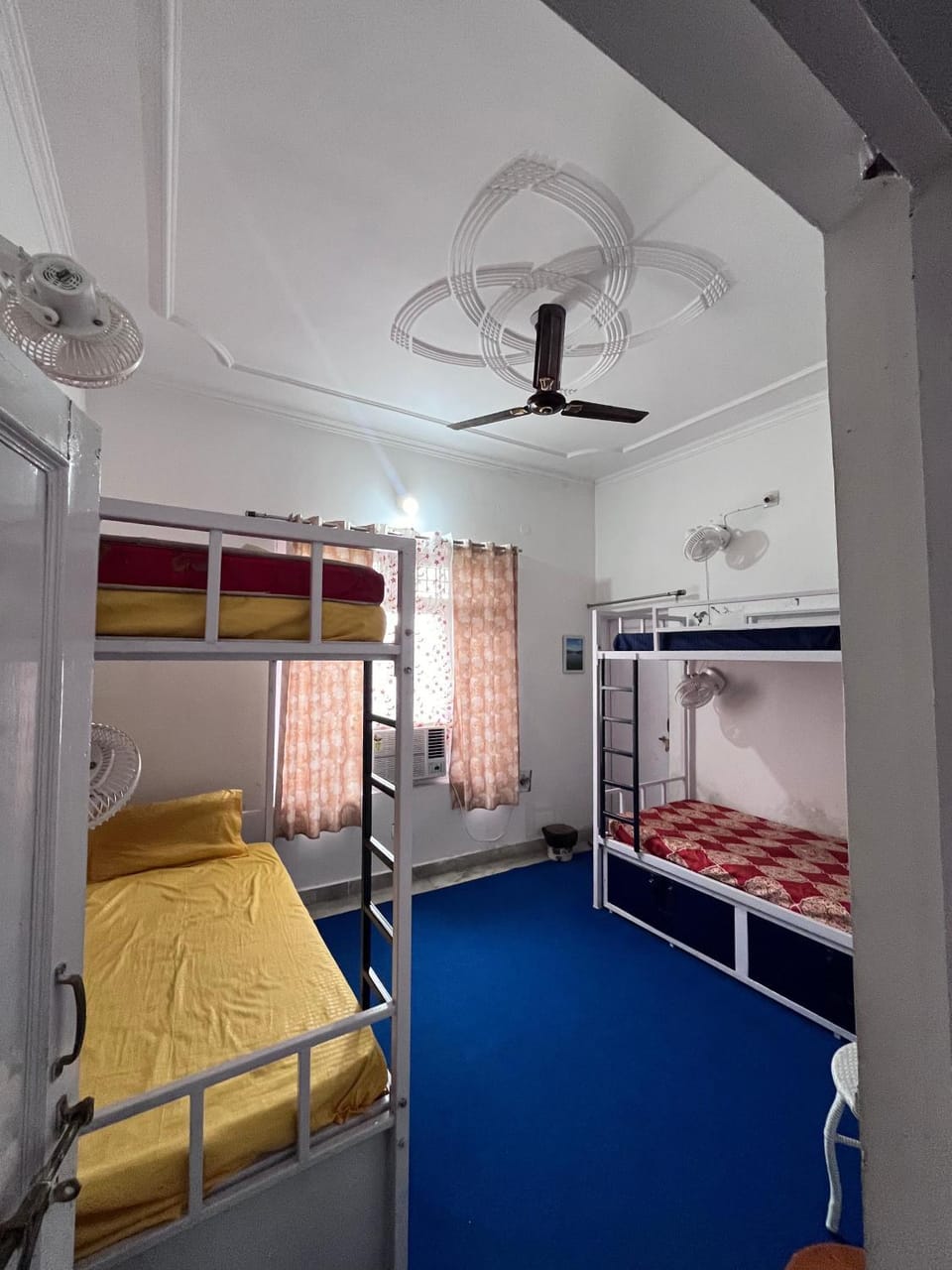 Photo of the whole room, bunk bed, air conditioner