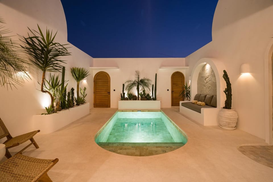 Property building, Facade/entrance, Night, View (from property/room), Seating area, Pool view, Swimming pool