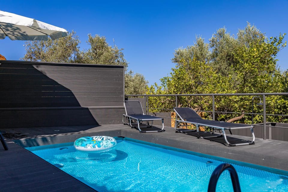 Patio, Day, Natural landscape, Pool view, Swimming pool, sunbed