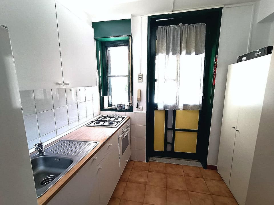 Kitchen or kitchenette, stove