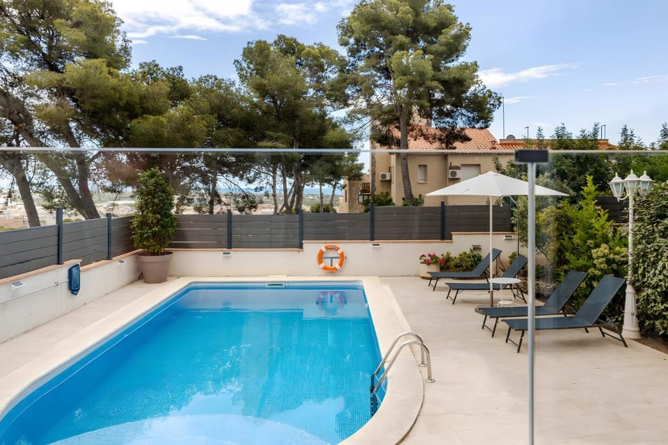 Property building, Living room, Swimming pool