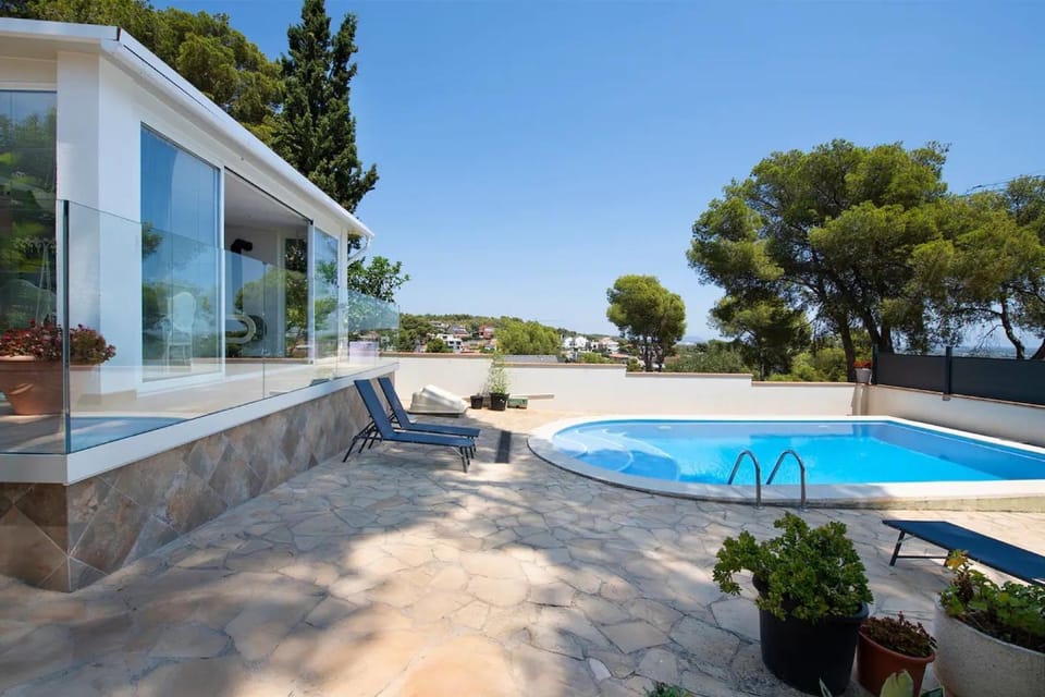Property building, Living room, Swimming pool