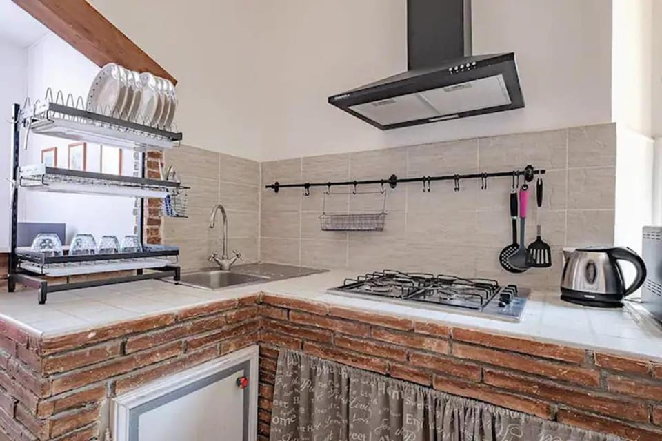 Kitchen or kitchenette, stove