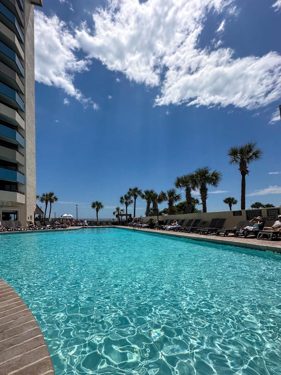 Swimming pool, sunbed