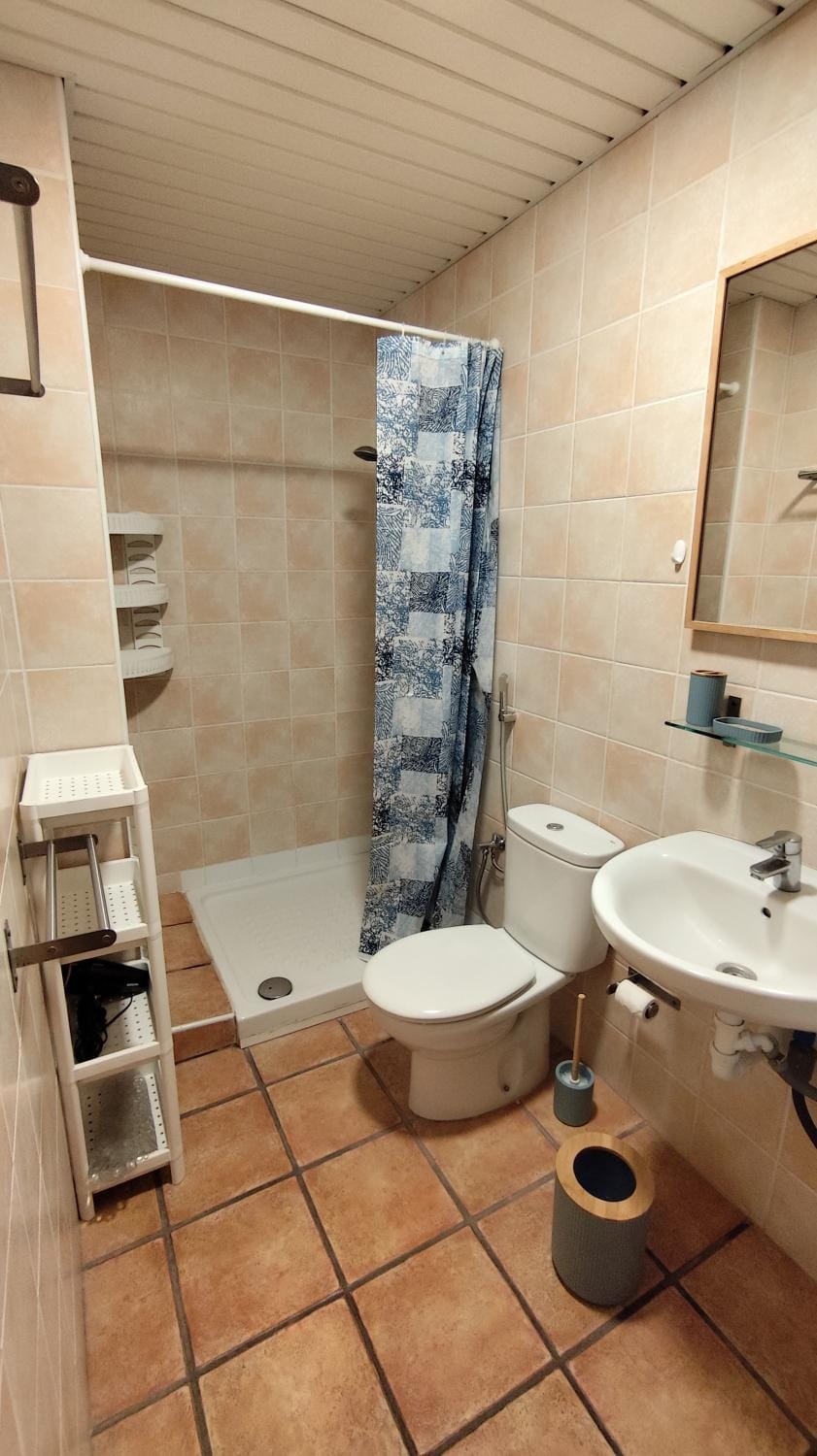 Shower, Bathroom, hair dryier, towels, towels, washing machine